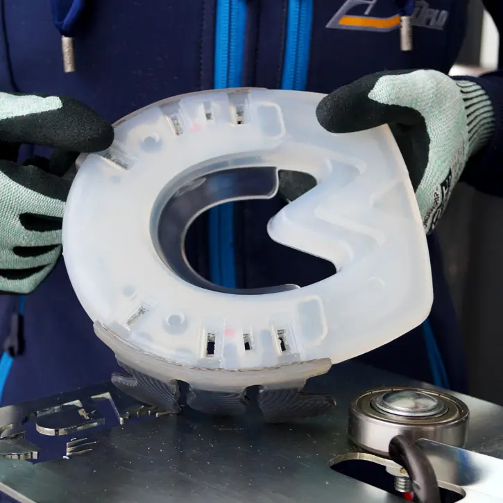 Close-up of a glue-on horseshoe made from a composite horseshoe called Nailless and Wolf Busch&reg; glue-on tabs