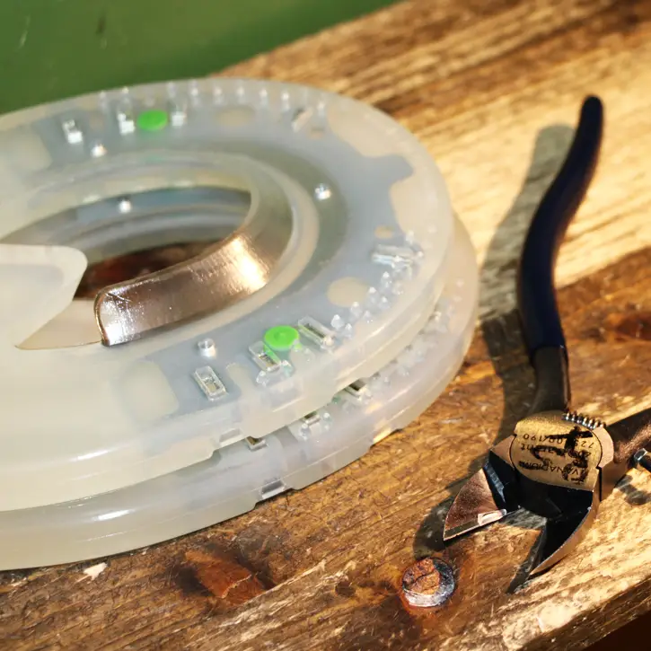 Close-up of the so-called Nailless synthetic horseshoe with green dots in the extra-hard version, after the sprues have been clipped off.